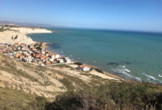 Faro di Capo Rossello景点图片