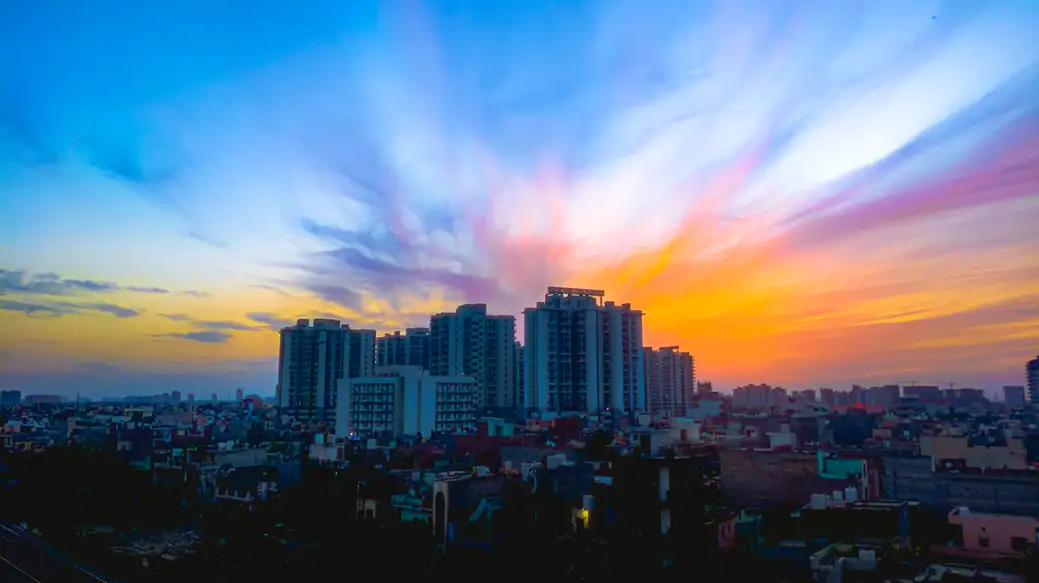 The sun rises over Gurgaon... Source: Sooraj Dev / unsplash