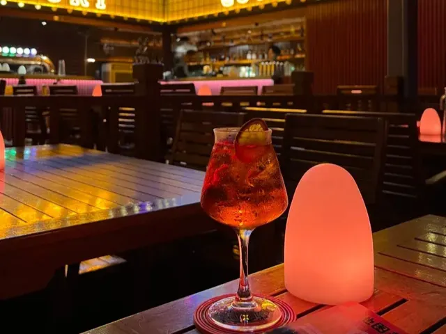 Sip cocktails at bars