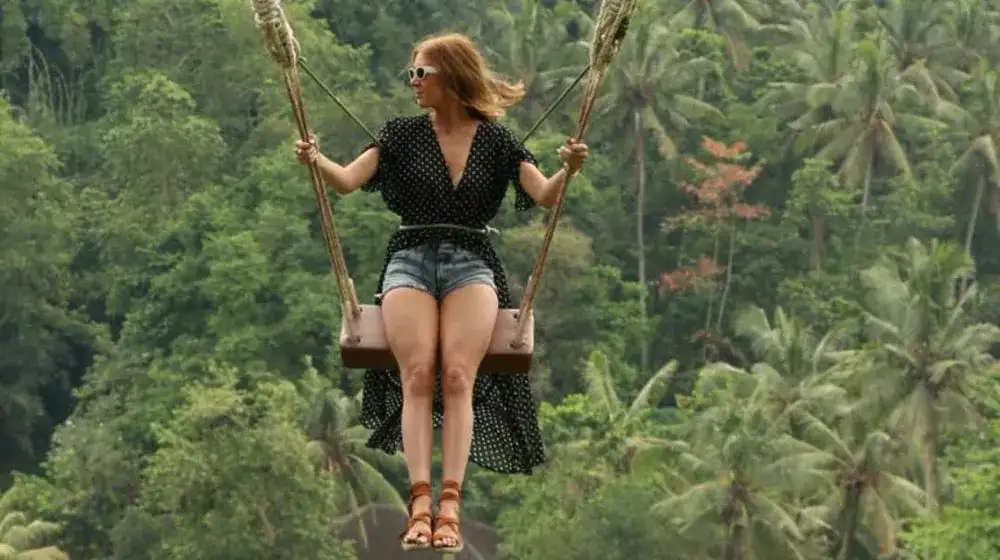 Person on the Bali Swing