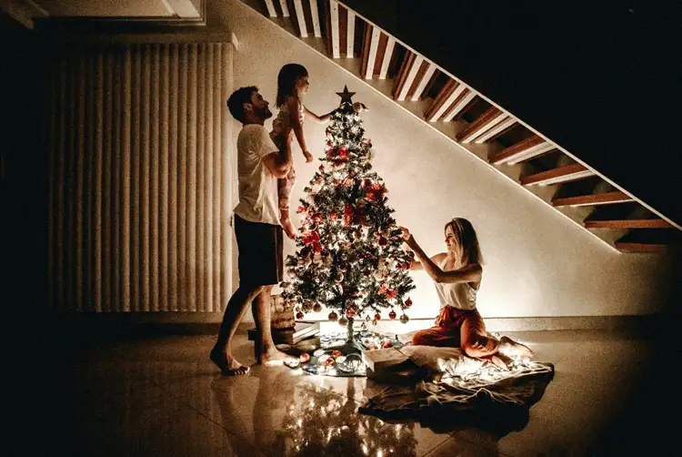 Source: Jonathan Borba/ unsplash Decorating the Christmas tree is always a fun family activity!
