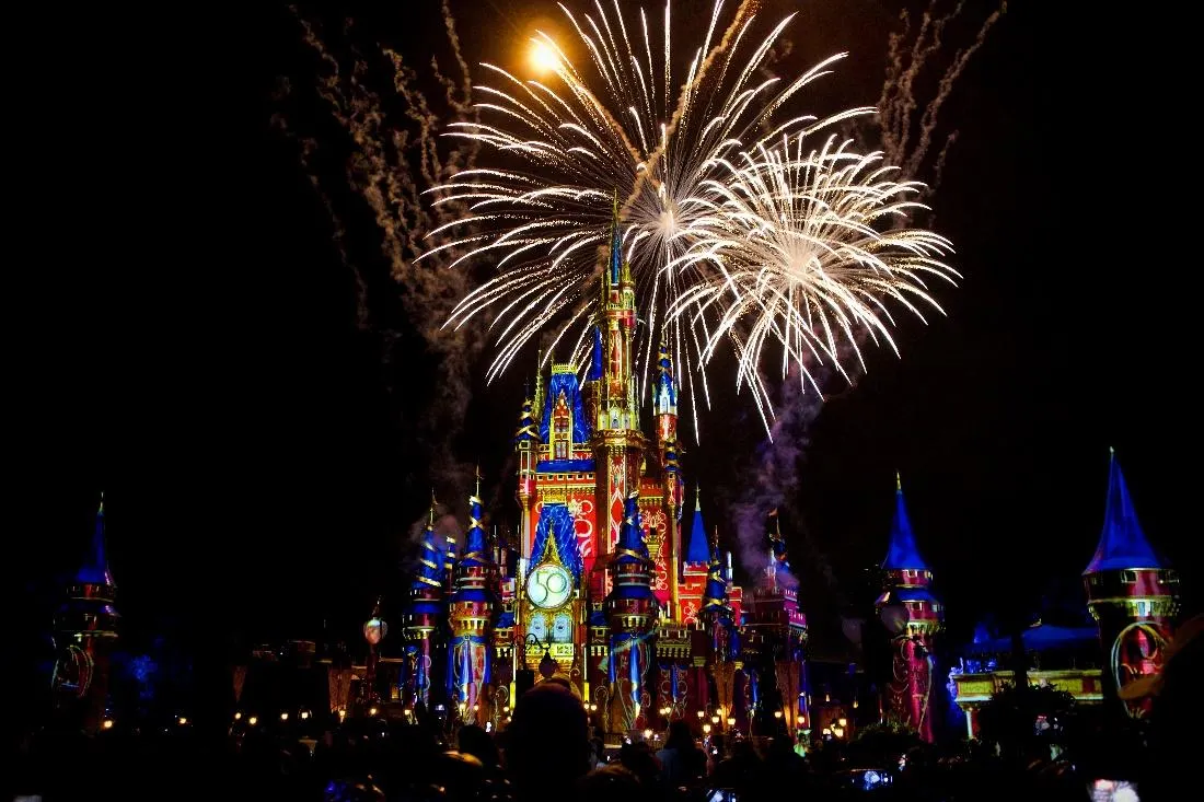 Watch as the Cinderella Castle light up with different projections during the Disney Christmas celebrations