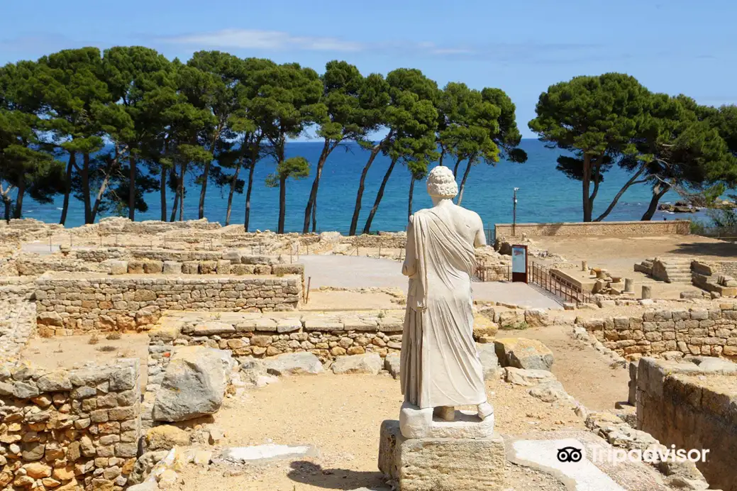 The statue of Asclepius watches over the ruins of Empuries.