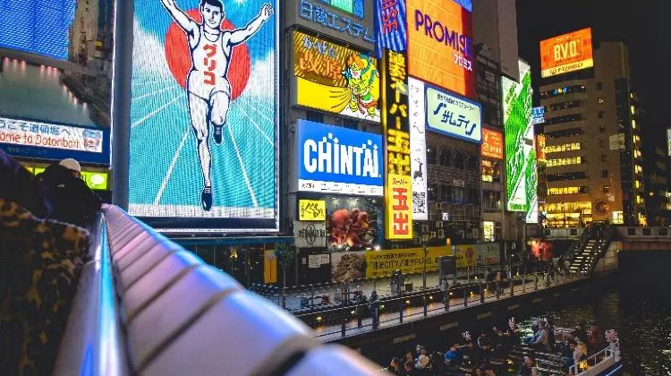 Source: Treddy Chen/ unsplash The famous Dotonbori Glico Man has been standing here since 1935.