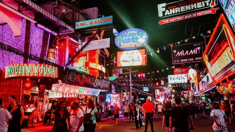 Pattaya Walking Street comes alive at night with its neon lights and bustling music.