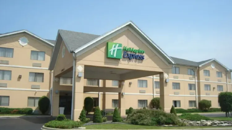 Modern hotel building under blue sky at Holiday Inn Express Louisville Northeast