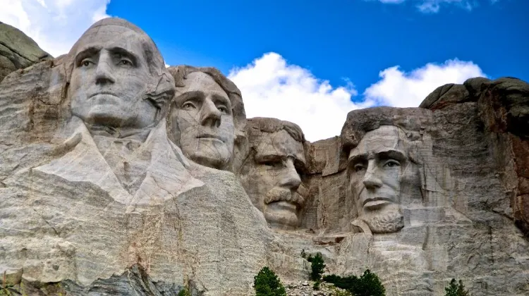 Source: Steve O/ unsplash The Mount Rushmore National Memorial in South Dakota bears the colossal sculpture of 4 great American presidents.