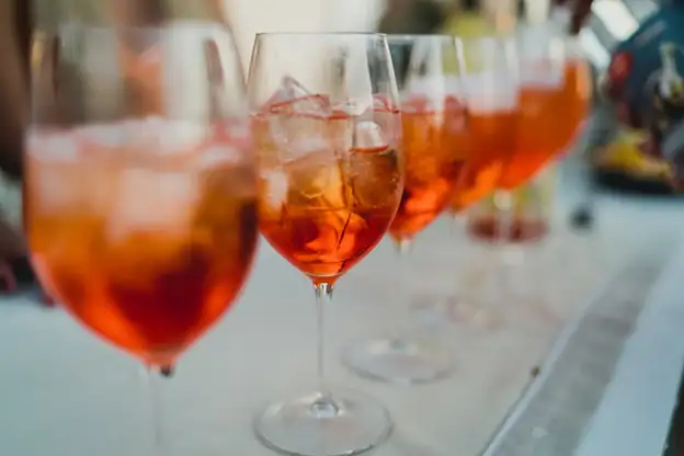 Row of Aperol Spritz drinks