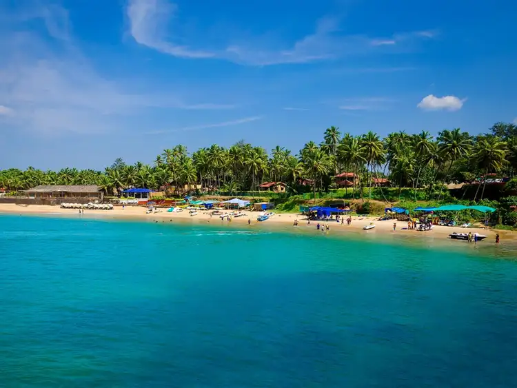 Source: alexey turenkov/ unsplash  Unwind on the sandy beaches under the blue skies with your partner at Goa!