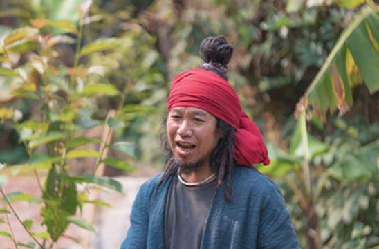 美国居然为版纳一村民发行邮票?这是真的 因为老美被他手上那支笔惊呆了!