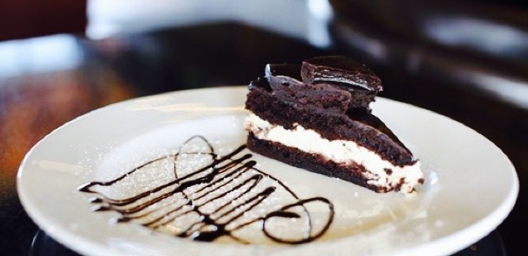 Symposium Cafe Restaurant & Lounge餐厅图片