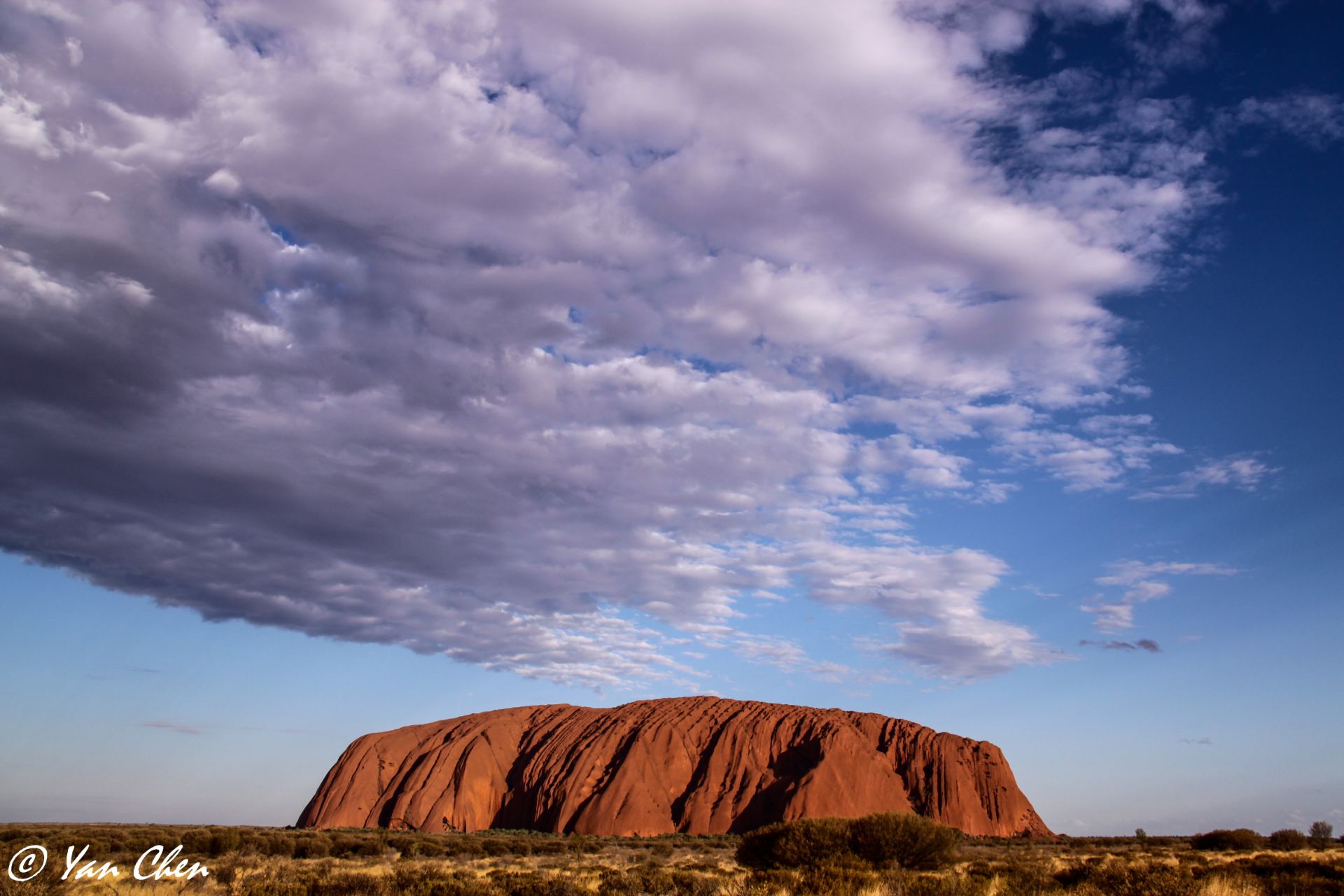 Uluru, or Ayers Rock, is a massive sandstone monol