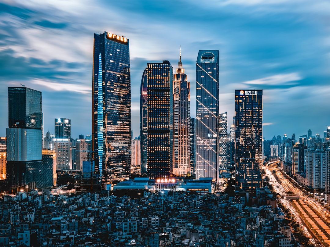 grey clouds hovering over city lights Via Unsplash (by Derch)