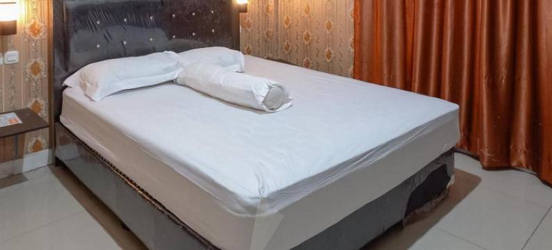 民宿辛加萨纳米特拉红门(Homestay Singgasana Mitra RedDoorz)图片