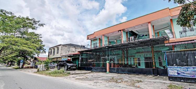 Hotel O 彭吉纳潘沙菲拉酒店，靠近穆斯塔明多柏迈1号住宅区(Hotel O Penginapan Syafira Near Perumahan Mustamindo Permai 1)图片