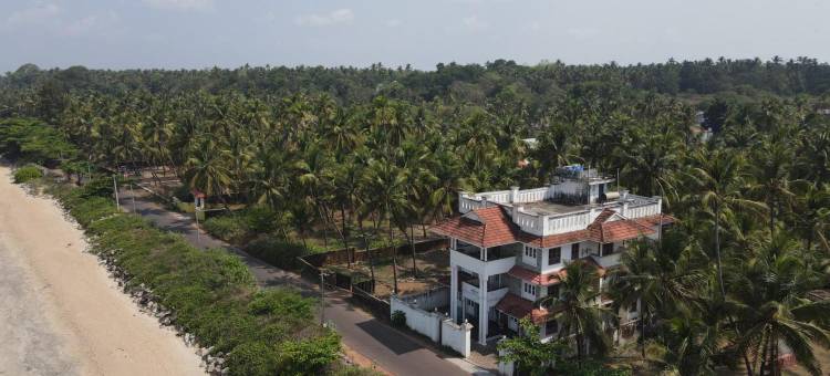 Rozana Retreats BeachVibe -kannur图片