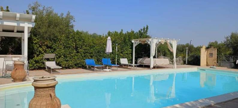 里索拉费利伽图里索托乐斯特尔酒店(L'Isola Felice e Trulli Sotto le Stelle)图片