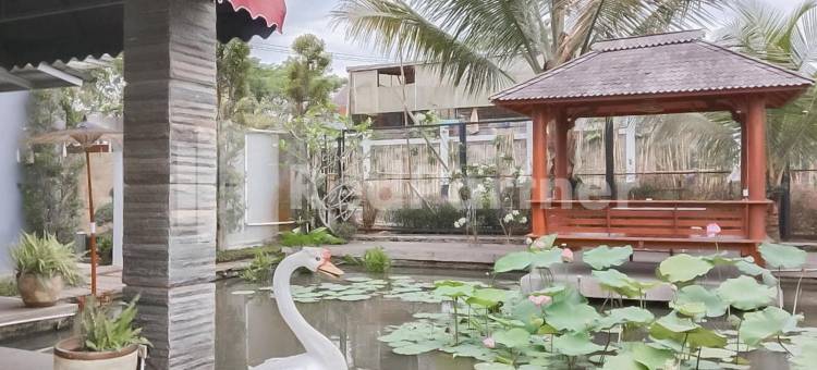 Khayrizsan Guest House Mitra RedDoorz图片