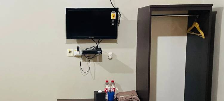 位于Tungkal Iv Kota的2卧室-800平方米|带1个独立浴室(Family Hotel Kuala Tungkal)图片