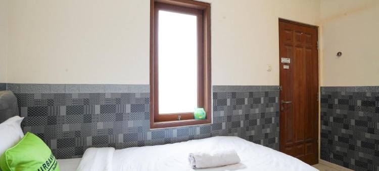 Urbanview Hotel Syariah Griya Asri Patran Near Tugu Station图片