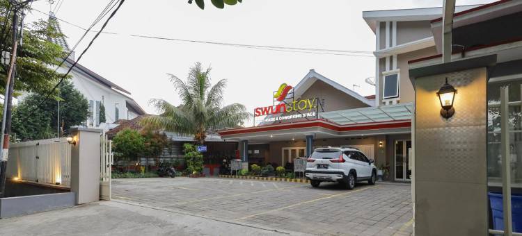 红门酒店加 @ 斯温住宿拉亚朗塞普(RedDoorz Plus at Swun Stay Raya Langsep)图片