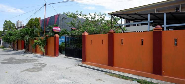 红多兹酒店-近帕卢朱弗利亚机场穆提亚拉SIS(RedDoorz Near Mutiara Sis Al Jufrie Airport Palu)图片