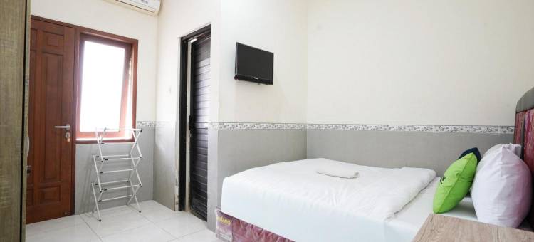 Urbanview Hotel Syariah Griya Asri Patran Near Tugu Station图片