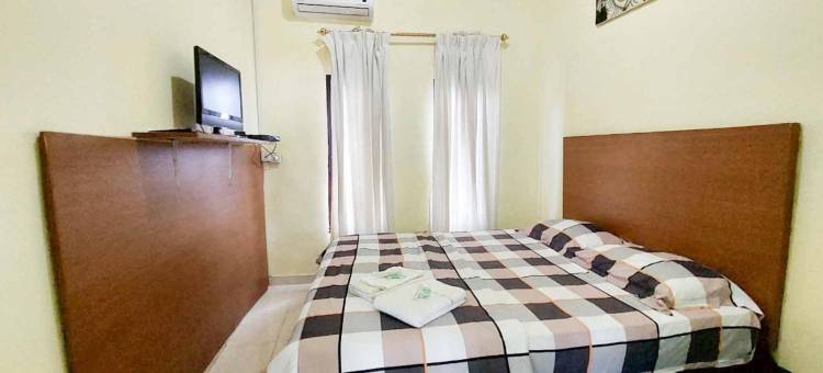 夸特里克迪民宿米特拉红门酒店(Quattrick Dee Homestay Mitra RedDoorz)图片