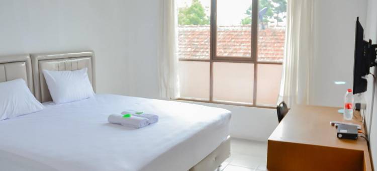 布米奇博莱德米特拉红门酒店-靠近帕穆利汉收费站(Bumi Ciboled Mitra RedDoorz Near Gerbang Tol Pamulihan)图片