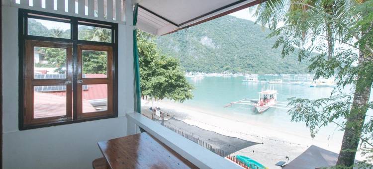 坦迪坎海滩小屋(RedDoorz @ Tandikan Beach Cottages)图片