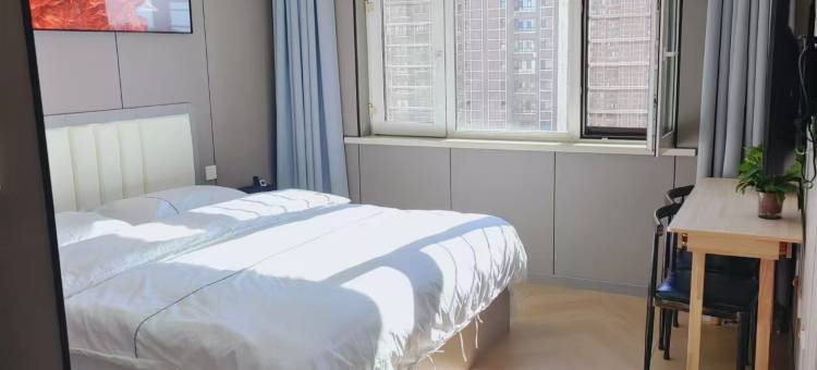 哈尔滨暮色民宿(江北大学城地铁站店)图片