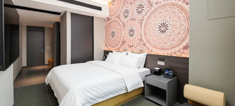 曼陀伦Plus智能酒店(江门和兴广场五邑华侨广场店)图片