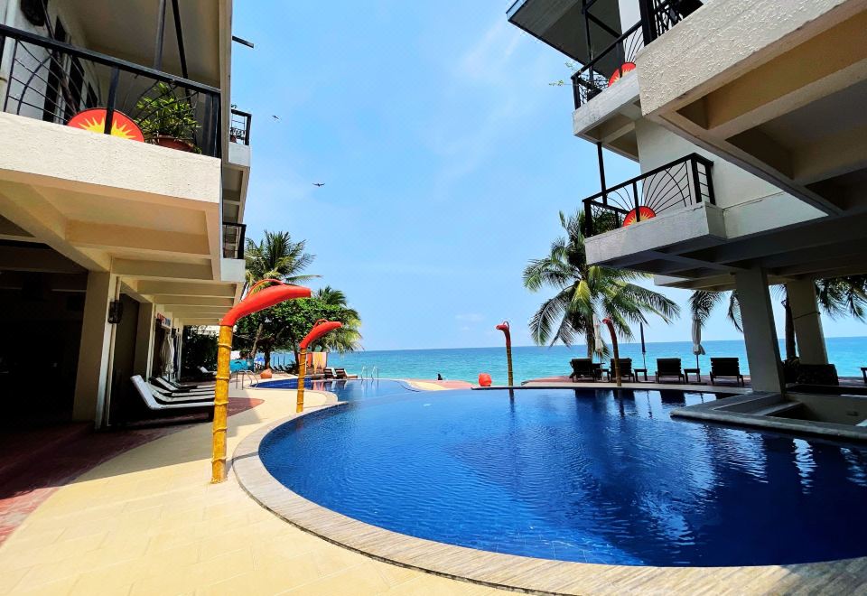 Sunset at Aninuan Beach Resort powered by Cocotel Hotel Overview