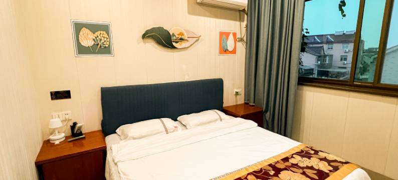 苏州玫瑰园商务宾馆(铜罗古镇店)图片