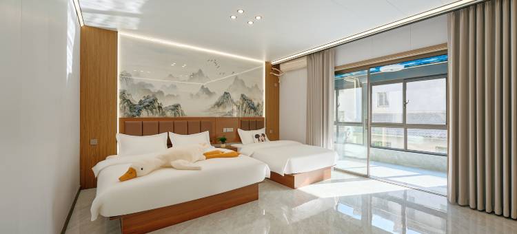 栖隐民宿(万岁山武侠城开封大学店)图片