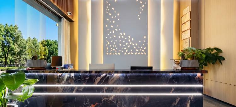 希亚顿·智能影音Leisure Time舒眠酒店(石城客运站宝福院塔店)图片