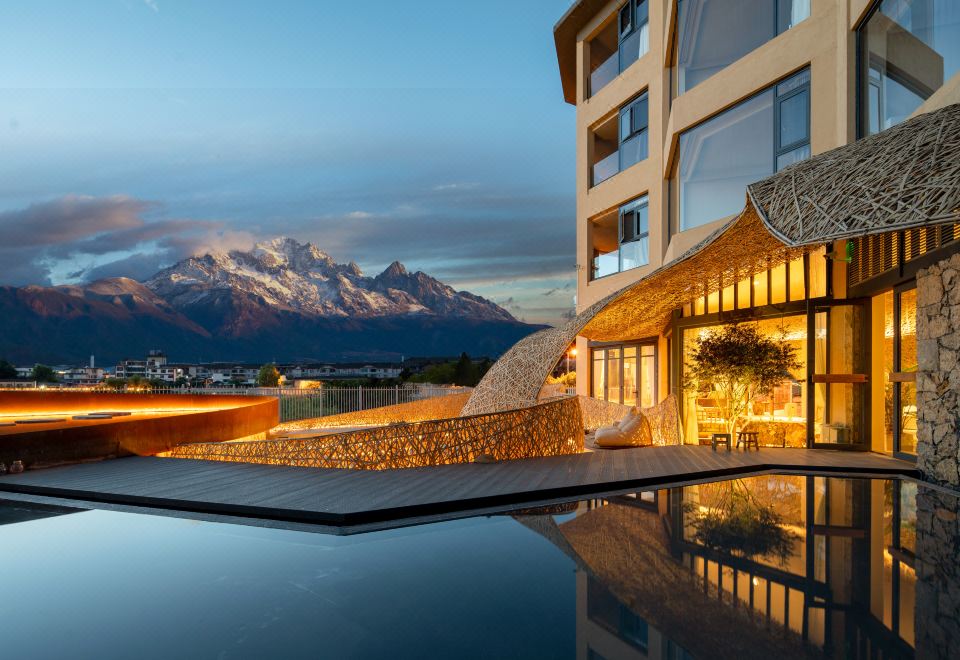 VENTO · Sunlit Golden Peak Lake View Vacation Hotel over view