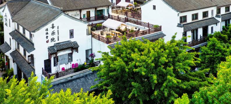 弥勒喜乐院酒店(湖泉水乡旅游度假区店)图片