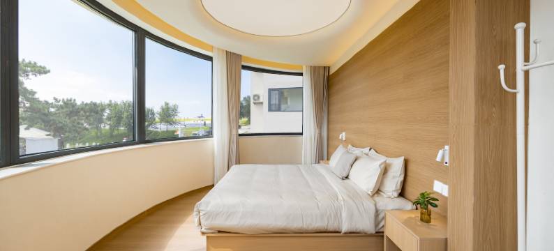 云漫酒店(火炬八街国际海水浴场店)图片