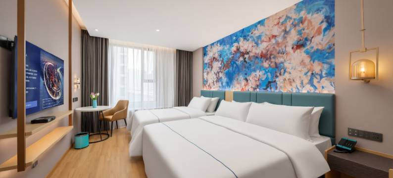 白玉兰商务酒店(青岛东方伊甸园金茂览秀城店)图片