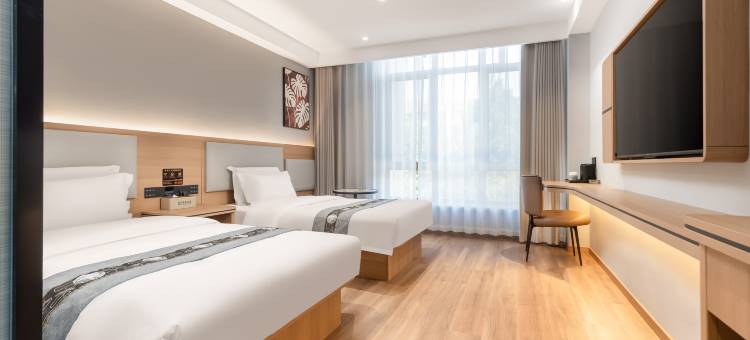 漫城酒店(天一生活广场店)图片