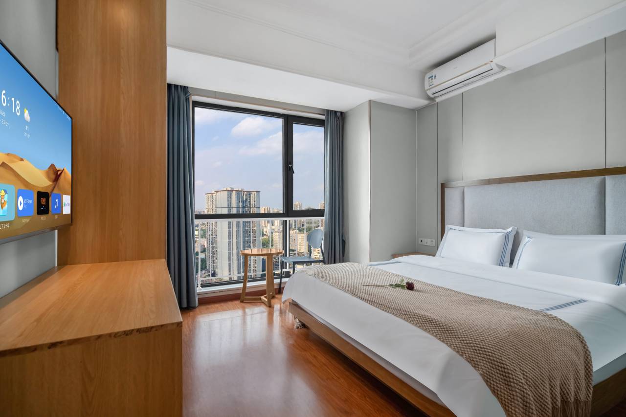 宿雨霁公寓(遂宁万达店)