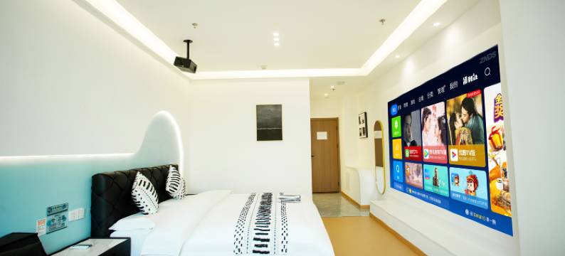 只有半朵设计师民宿(邹城百盛财富中心店)图片