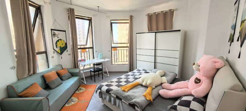 亿间居(阳光半岛店)图片