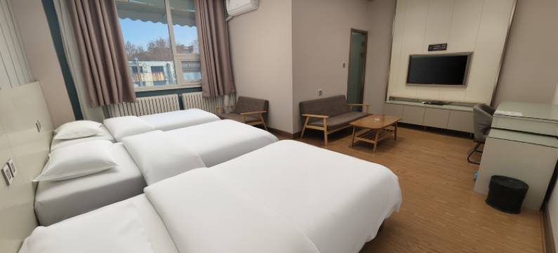 曼卡金苹果酒店(费县东方购物广场店)图片