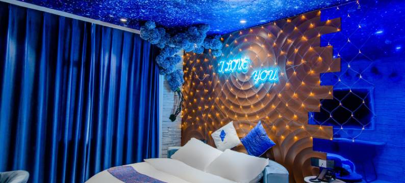 慕鸣主题酒店(庆云石佛大街红磡龙著店)图片