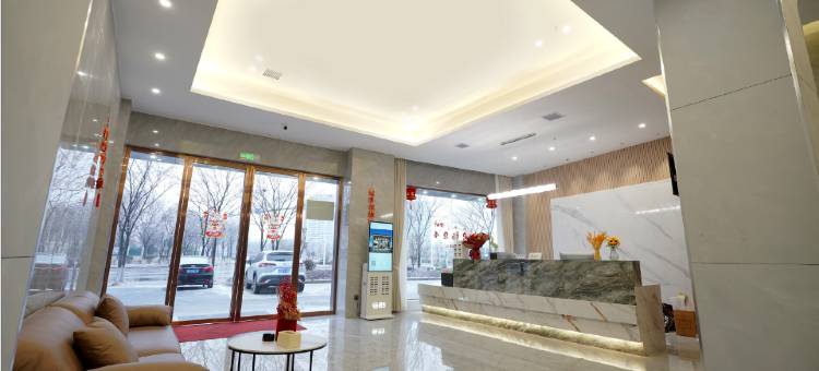 O_W桔子周酒店(南县人民医院店)图片