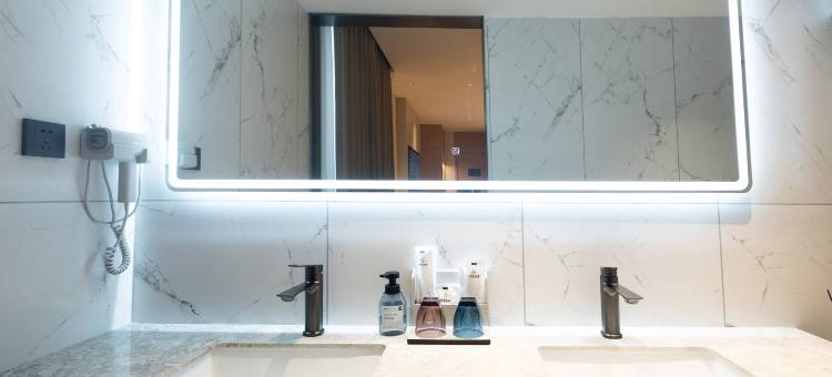 大庆谷爱精品酒店(大庆西站景园公园店)图片