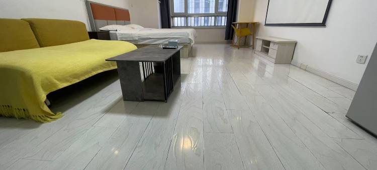 逸居民宿(开发区万达广场店)图片