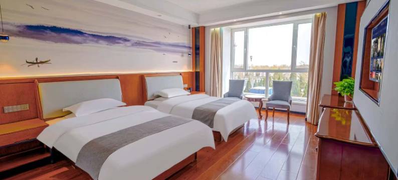 德馨商务宾馆(磴口县政务中心磴口站店)图片